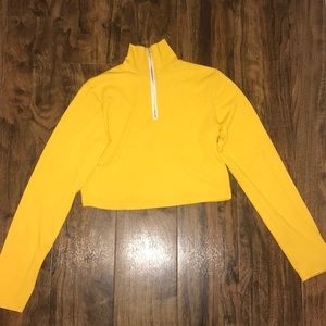 A turtle neck long sleeve crop top